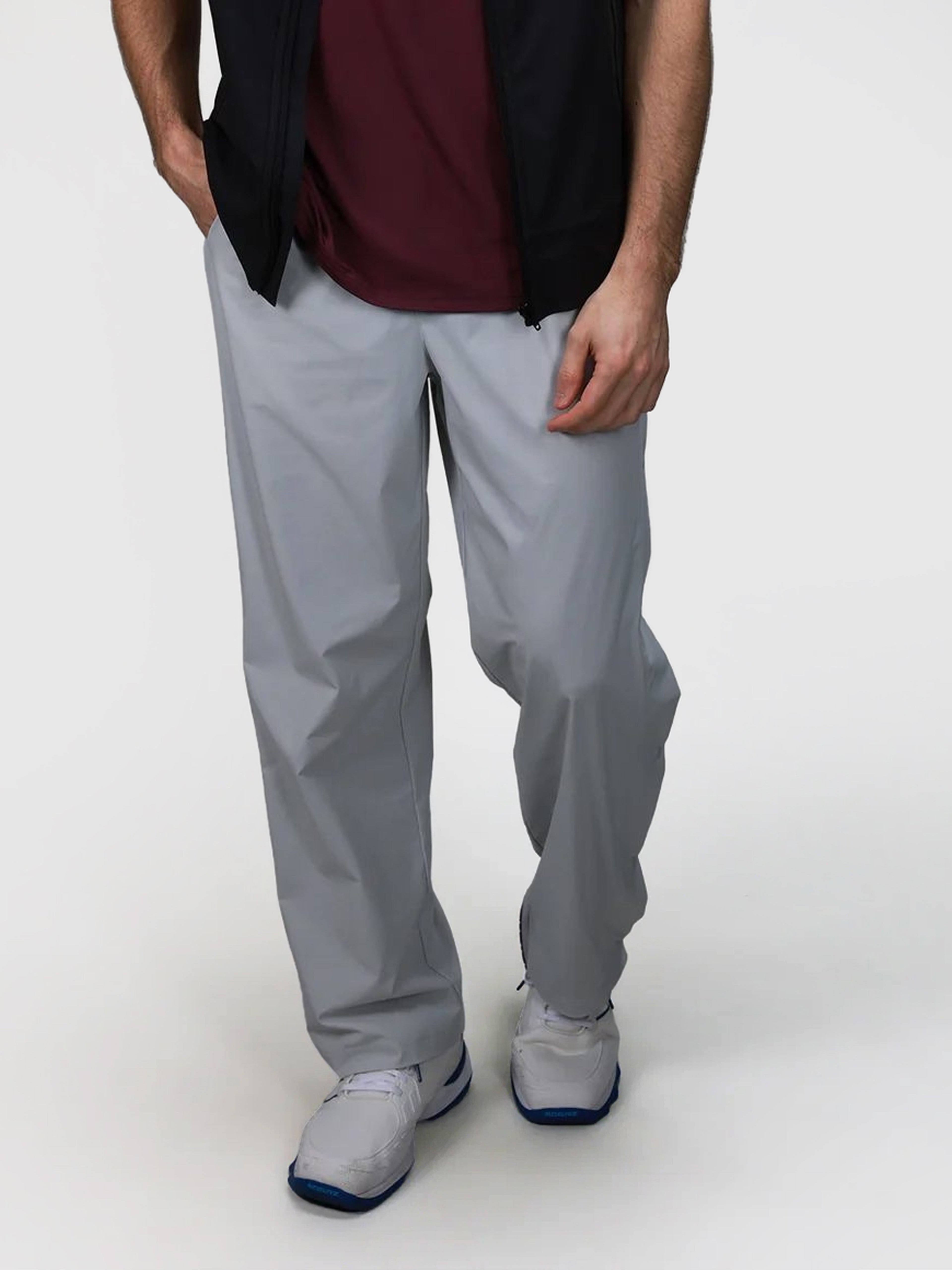 Front view of gray J Sas Tear Away Pant by MUEV designed for padel and pickleball clothing with relaxed fit