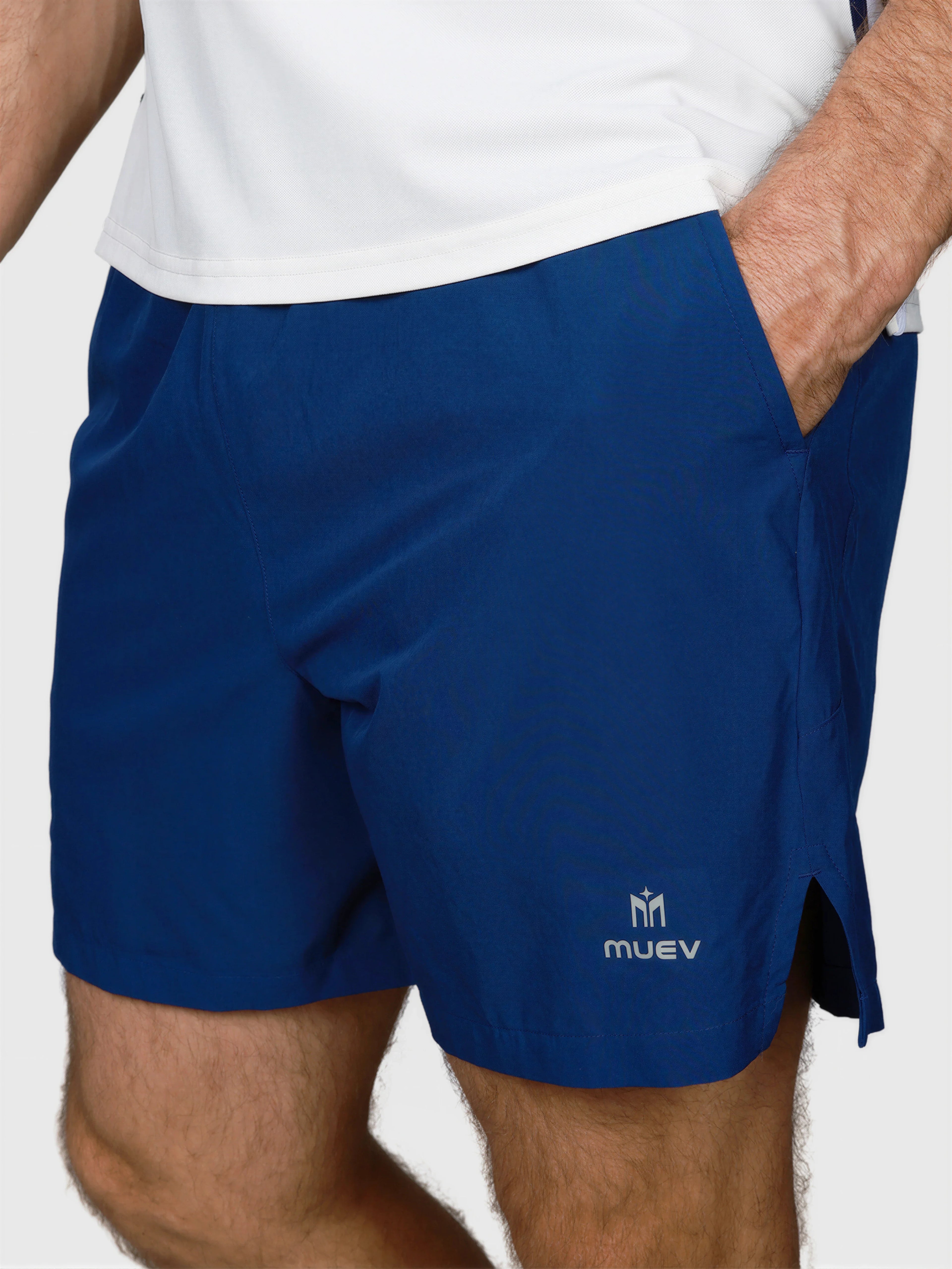 close-up side view of man wearing Navy Base Line Short by MUEV designed for padel and pickleball apparel